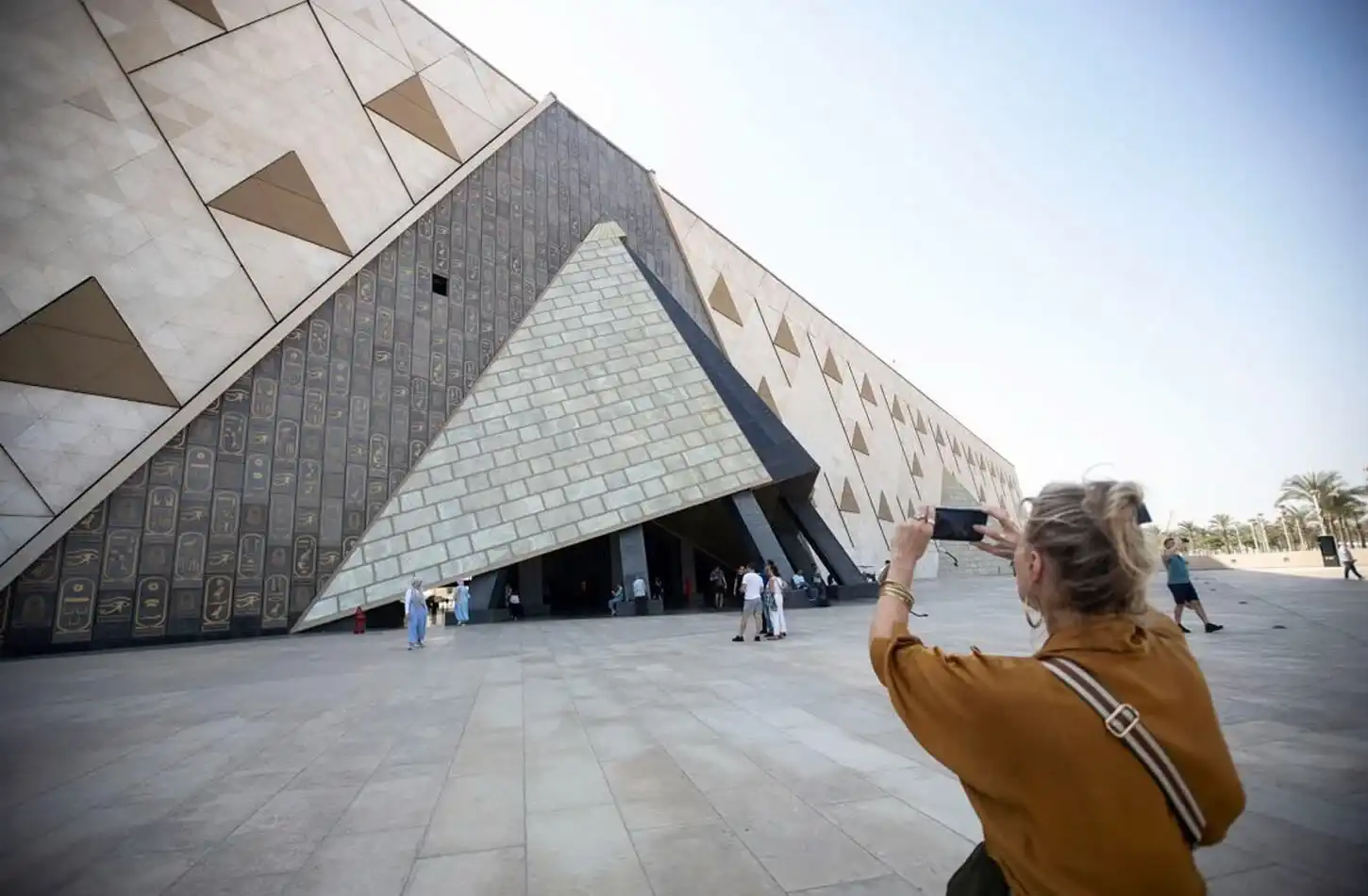 Discover the Top Attractions in Egypt You Must See A-wonderful-picture-of-a-woman-in-front-of-the-Grand-Egyptian-Museum
