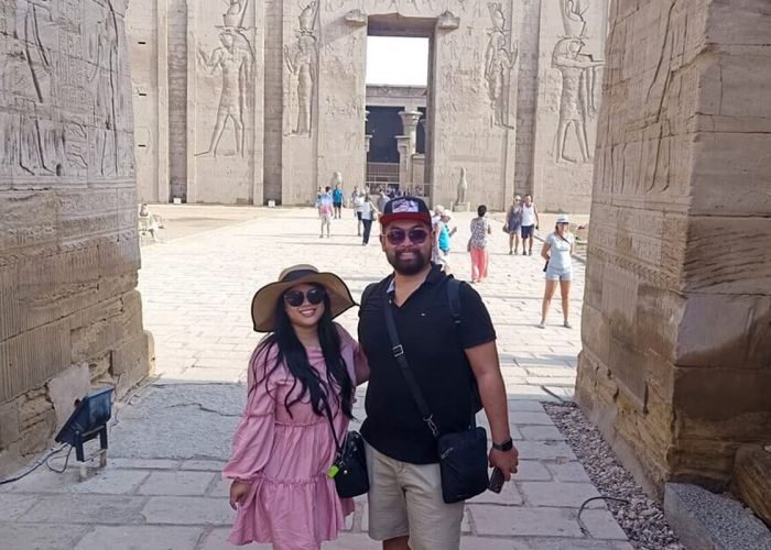 A-wonderful-photo-of-a-couple-from-our-visitors-in-front-of-the-Edfu-Temple.