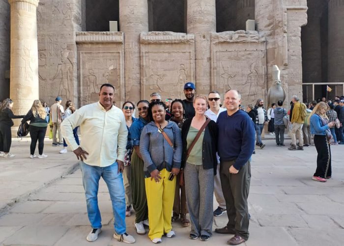 A-wonderful-photo-of-one-of-our-groups-in-front-of-Edfu-Temple.