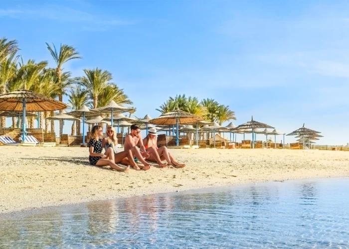 A-very-beautiful-picture-of-a-group-of-tourists-on-the-beach-in-Port-Ghalib.jpg.webp