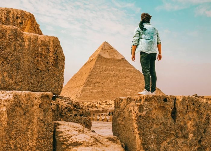 Tourist-man-standing-in-front-of-the-pyramid-of-Khafre.jpg