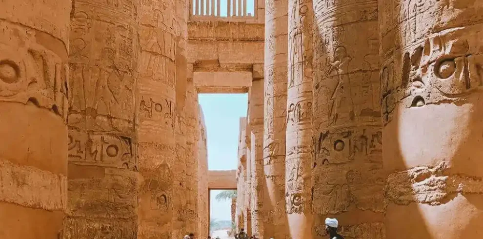 2 Days Luxor City Tours From Hurghada A-picture-of-some-visitors-near-the-columns-of-Karnak-Temple.