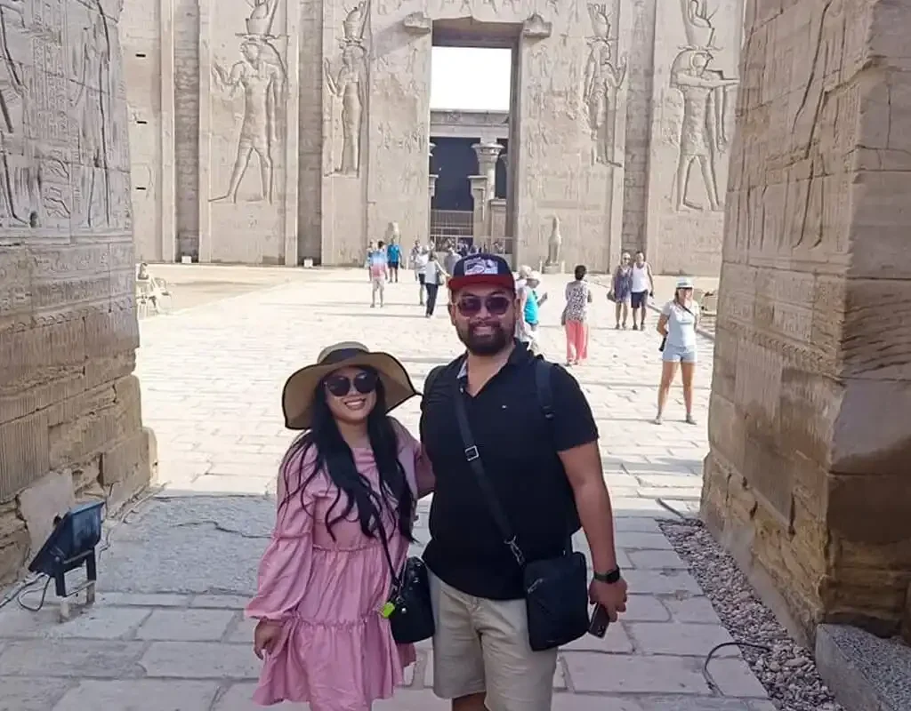 11 Days All-Inclusive Egypt Tour – Cairo, Cruise & Sharm A-wonderful-photo-of-a-couple-from-our-visitors-in-front-of-the-Edfu-Temple.