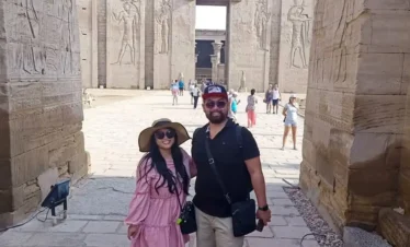 11 Days All-Inclusive Egypt Tour – Cairo, Cruise & Sharm A-wonderful-photo-of-a-couple-from-our-visitors-in-front-of-the-Edfu-Temple.