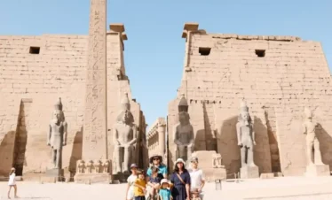 7-Day Cairo & Nile Cruise Tour by Flight A-wonderful-photo-of-a-family-in-front-of-Luxor-Temple