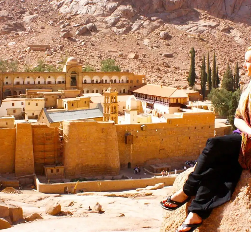 6 Days Cairo and Aswan with Abu Simbel Temple A-wonderful-picture-of-a-tourist-in-front-of-St.-Catherines-Monastery