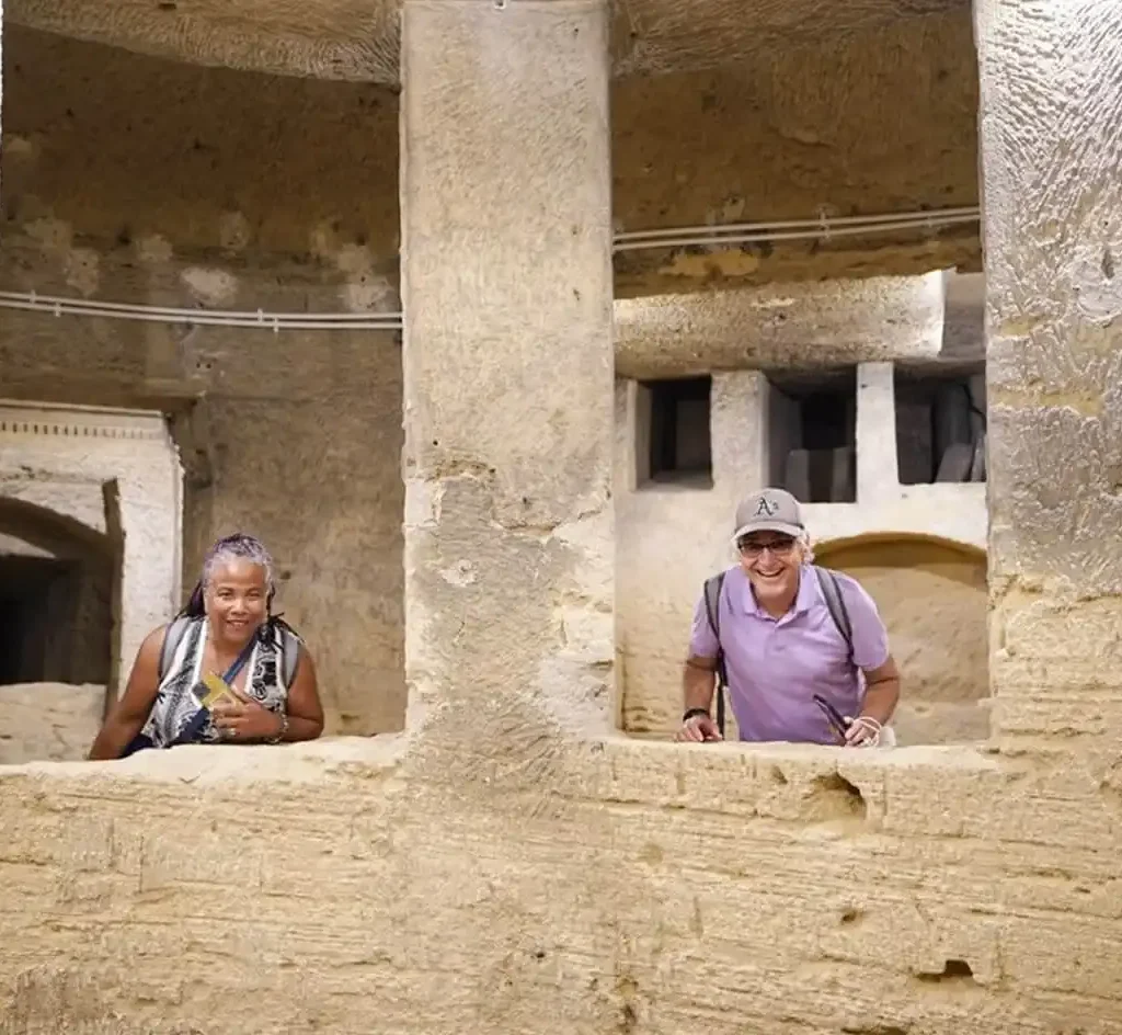 A-wonderful-picture-of-some-tourists-from-Kom-El-Shoqafa-in-Alexandria 4 Days Cairo and Alexandria – Egypt Short Break A-wonderful-picture-of-a-person-in-front-of-Pompey's-Column-in-Alexandria.