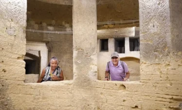 A-wonderful-picture-of-some-tourists-from-Kom-El-Shoqafa-in-Alexandria 4 Days Cairo and Alexandria – Egypt Short Break A-wonderful-picture-of-a-person-in-front-of-Pompey's-Column-in-Alexandria.