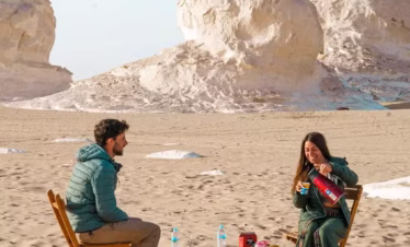 A wonderful shot of a couple enjoying breakfast in Bahariya Oasis