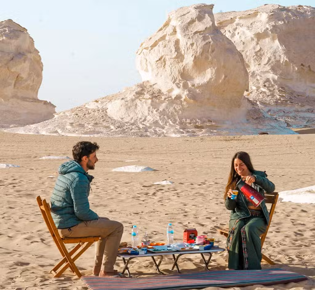 All Tour A wonderful shot of a couple enjoying breakfast in Bahariya Oasis