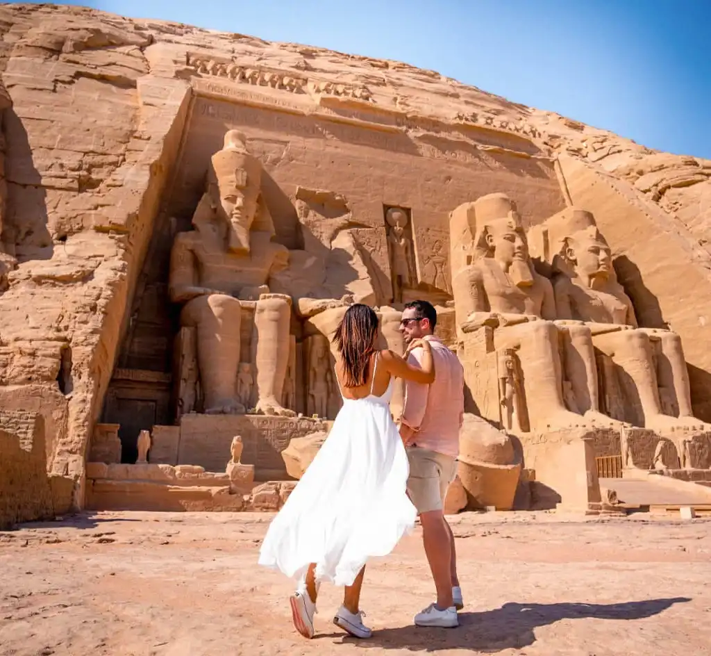 6 Days Cairo and Aswan with Abu Simbel Temple a-photo-of-a-couple-in-front-of-abu-simbel-temple-in-aswan