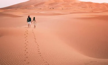 A-couple-from-a-safari-in-the-desert-of-Egypt 4-Day Bahariya Oasis & Djara Cave Tour from Cairo