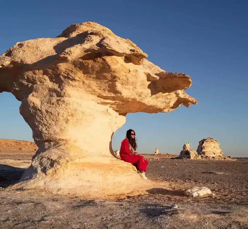 A-wonderful-picture-of-a-girl-on-one-of-the-white-dunes-of-the-White-Desert