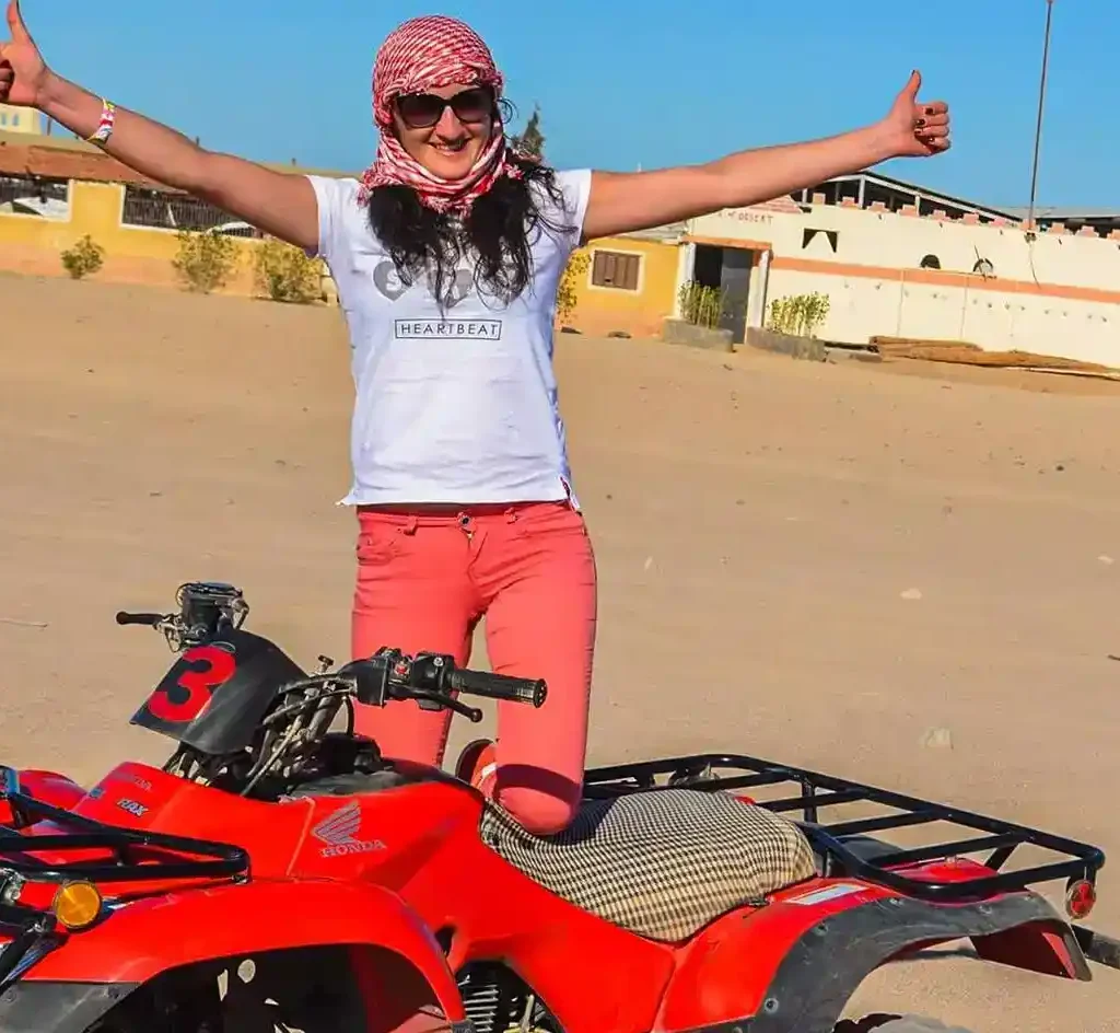 Quad Biking in Sharm El-Sheikh Desert A-wonderful-shot-of-a-girl-getting-ready-to-ride-a-quad-bike