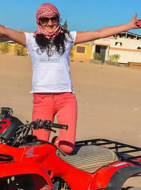 Quad Biking in Sharm El-Sheikh Desert A-wonderful-shot-of-a-girl-getting-ready-to-ride-a-quad-bike