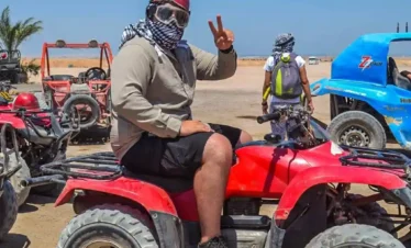 Quad Biking in Sharm El-Sheikh Desert A-wonderful-shot-of-a-person-riding-a-quad-bike-from-one-of-the-safari-trips-in-Hurghada