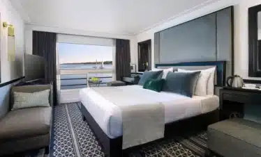 The Grand Staircase inside the Grand Egyptian Museum lined with ancient Egyptian statues Top 10 Famous Landmarks in Egypt