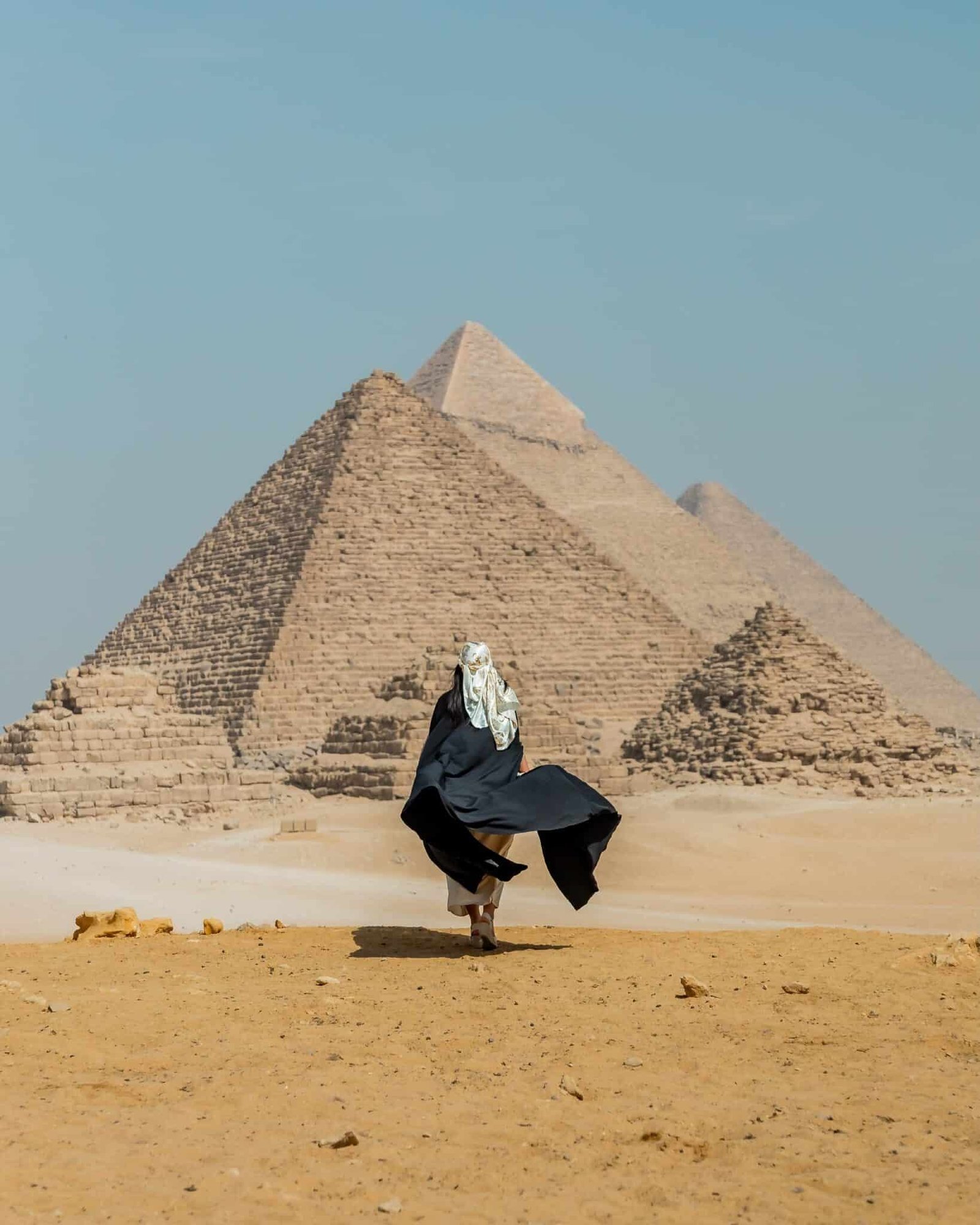 Traveler walking near the Pyramids of Giza