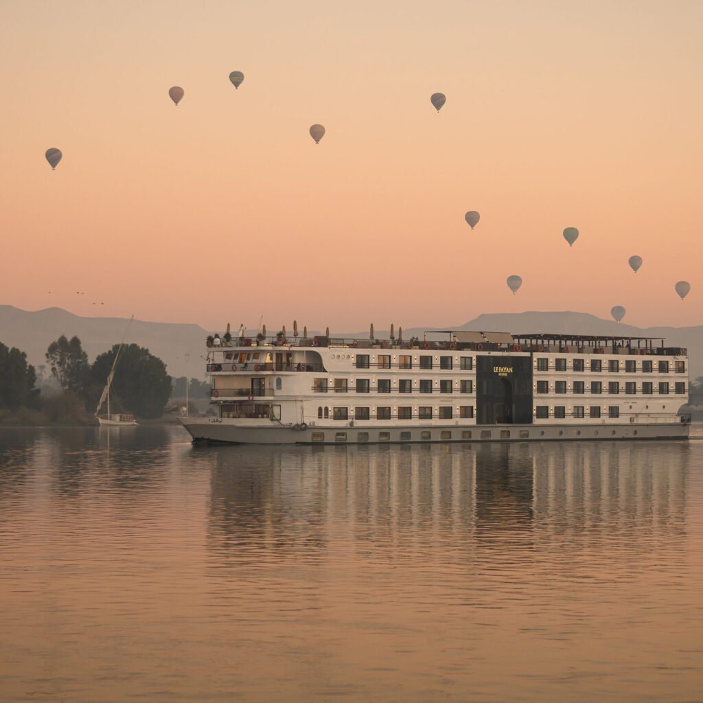 Le Fayan Suites luxury Nile cruise sailing near Luxor with hot air balloons