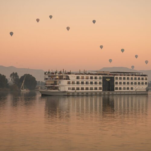 Le Fayan Suites luxury Nile cruise sailing near Luxor with hot air balloons
